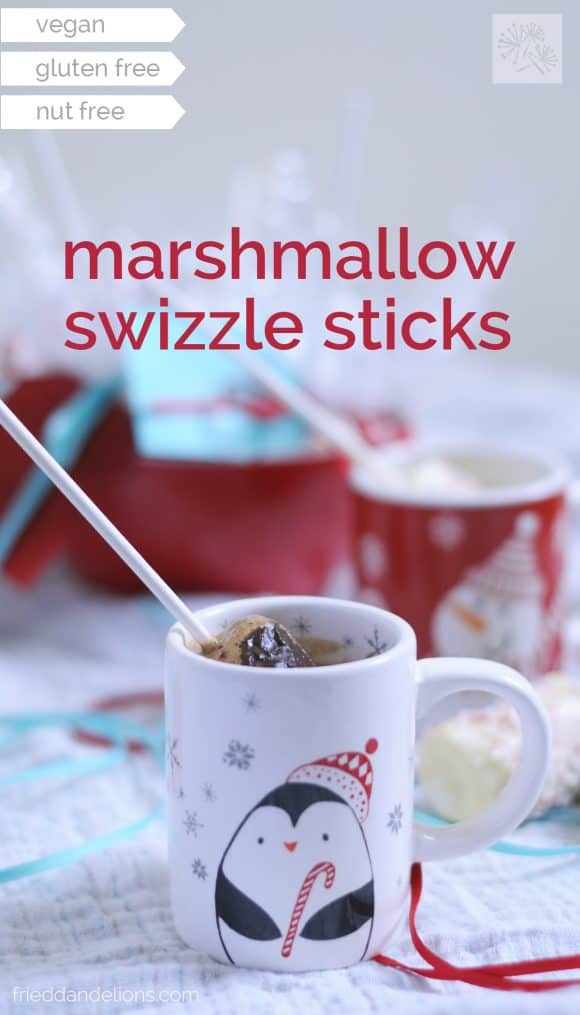 marshmallow swizzle sticks in a cup of hot chocolate