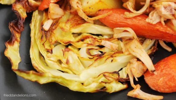 roasted cabbage served with vegan corned jackfruit and carrots