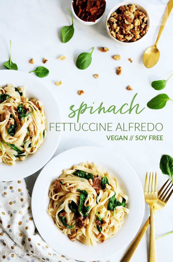 overhead view of vegan spinach fettuccine alfredo with text overlay