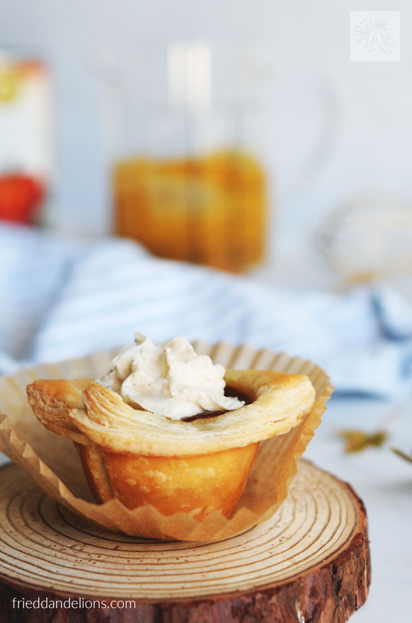 front view of puff pastry pumpkin pie cups